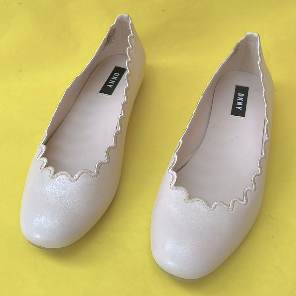 Baby pink DKNY leather flats